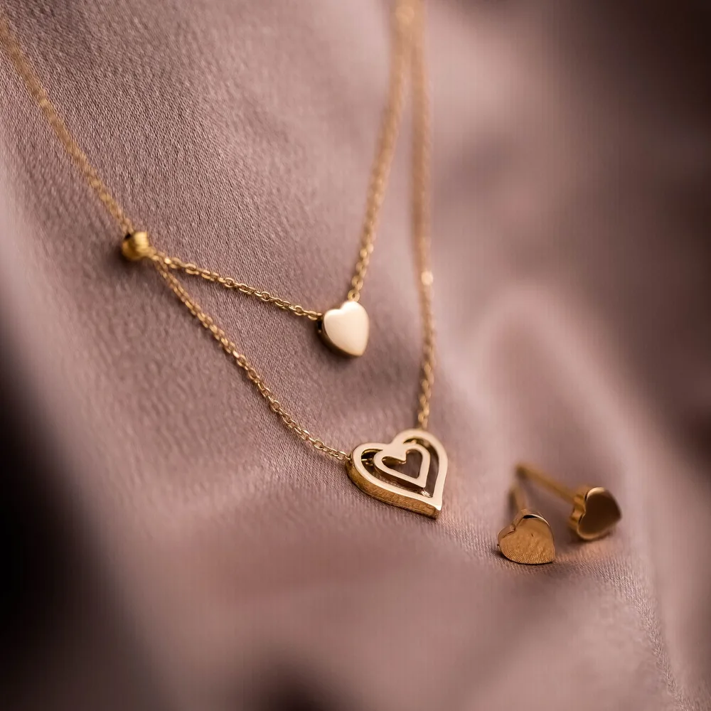 Conjunto corazones: collar doble y aros